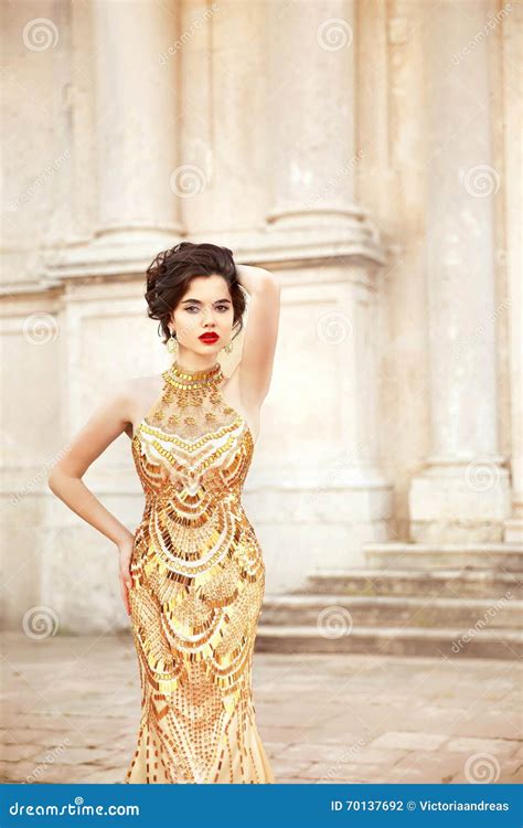 Fashion Model In Gold Dress Beautiful Brunette In Elegant Stock Photo Image Of Glam Close