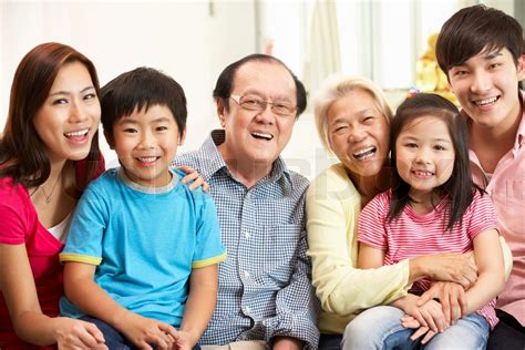 portrait  multi generation chinese family relaxing  home