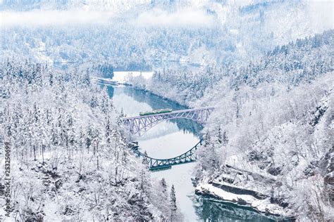 Tadami Line Train across Tadami River in Winter, Fukushima, Japan Stock ...