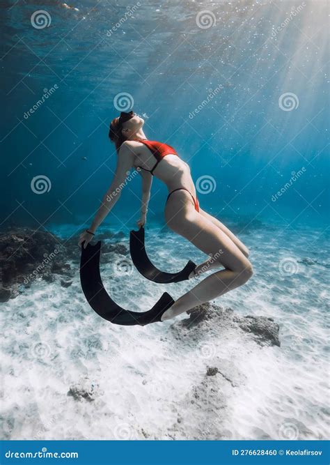 Woman In Bikini Underwater In Blue Ocean Free Diver Girl With Diving