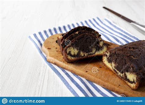 Homemade Chocolate And Vanilla Marble Cake On A Rustic Wooden Board Side View Copy Space Stock