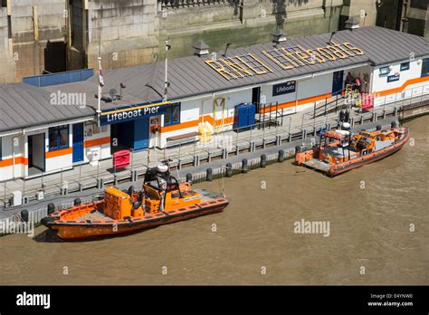 Brawn Challenge And Legacy Berthed Rnli Lifeboat Station On The River