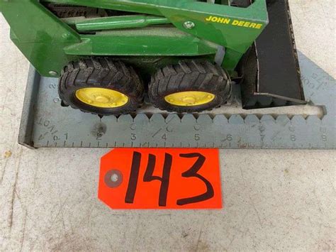 John Deere Skid Loader - Meagher Auctioneers