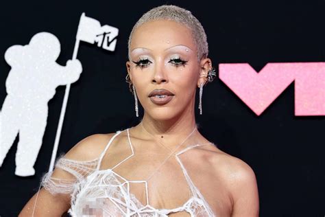 Doja Cat Commands Attention In The Ultimate Naked Dress And Thong At