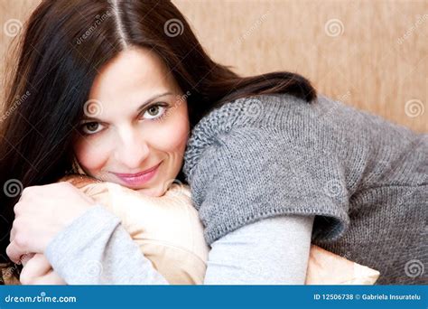 Beautiful Brunette Relaxing On The Sofa Royalty Free Stock Photos Image 12506738