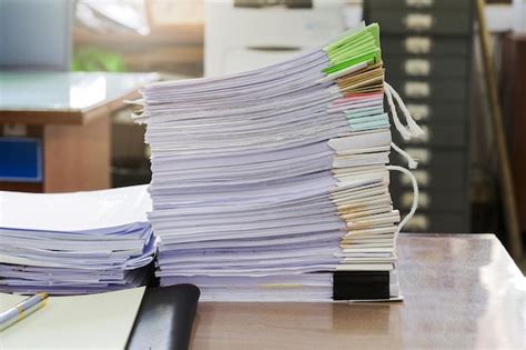 Premium Photo Close Up Of Papers On Table