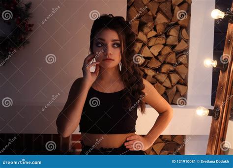 Pretty Brunette Poses In Studio With Fireplace Stock Image Image Of Glamour Girl