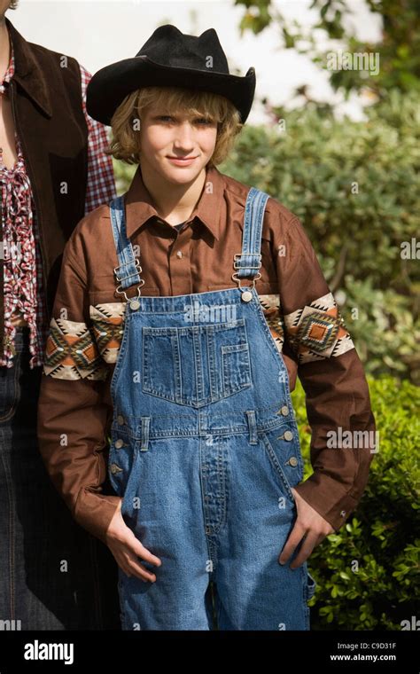 Country boy in overalls hi-res stock photography and images - Alamy