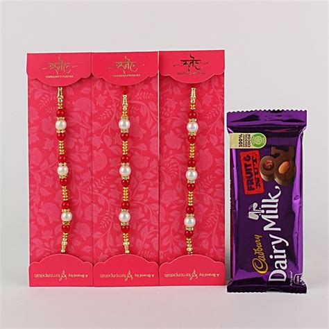 Buy Send 3 White N Red Pearl Rakhi With Fruit N Nut Mp Online FNP