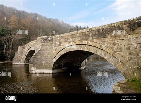 16th Century Stone Arched Bridge Across River Eamont In Lake District