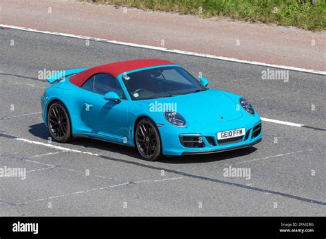 Blue porsche hi-res stock photography and images - Alamy