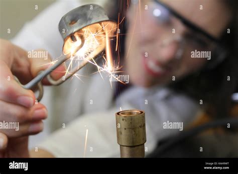 Bunsen Burner Being Lit Stock Photo Alamy