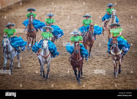 Escaramuzas Ride Their Horses A Charreada Mexican Rodeo At The Lienzo