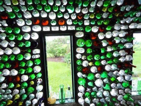 Backyard DIY Projects: Glass Bottles – bunglo. in 2024 | Bottle house, Glass bottle diy projects ...