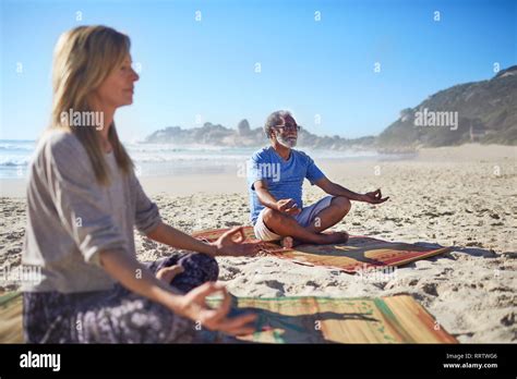 Man Meditating Beach Hi Res Stock Photography And Images Alamy