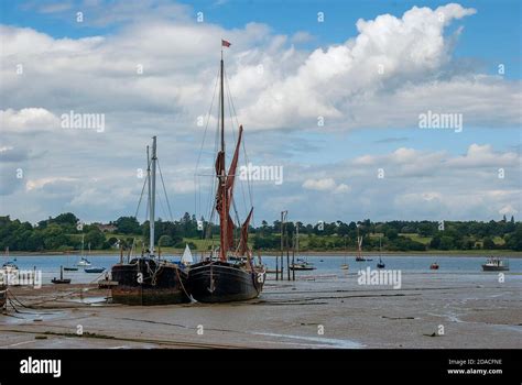 Boats Stranded By Low Tide On The River Orwell At Pin Mill Suffolk Uk