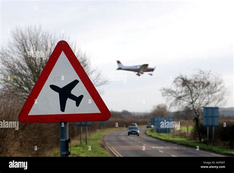 Warning Low Flying Aircraft Road Sign At Wellesbourne Airfield