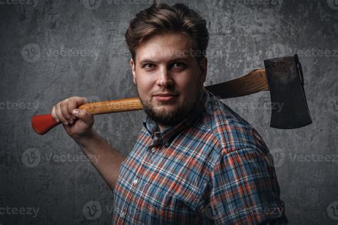 Bearded Man With Axe Posing In Studio 16114433 Stock Photo At Vecteezy