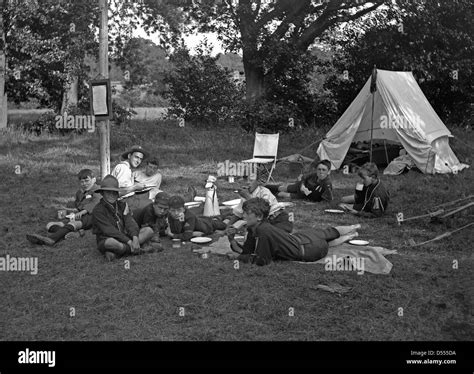 Boy scouts camp, c. 1930 with tent pitched and the scouts and scout ...