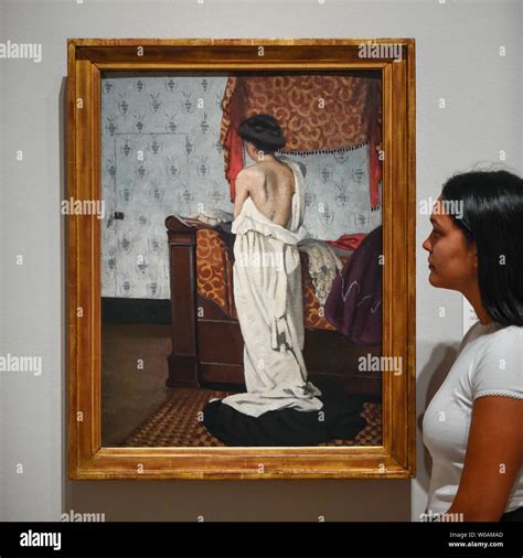 London UK 27 June 2019 A Staff Member Views Nude Seen From Behind In An Interior Nu De Dos