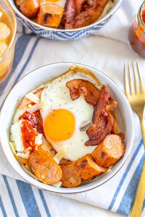 Grits Breakfast Bowls with Sausage, Bacon, and Red Chile Sauce