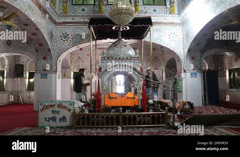 Sikh devotees fanning doing Chaur Sahib inside Gurdwara Panja Sahib ...