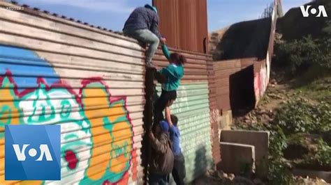 Us Border Patrol Detains Migrants Climbing Border Fence At Tijuana