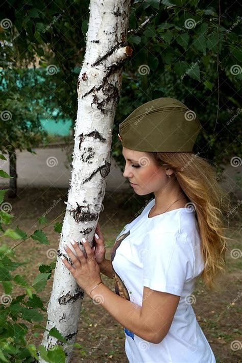 Girl In A Military Garrison Cap About A Birch Stock Image Image Of Katyusha Birch 75689317