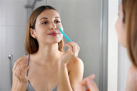 Beautiful Young Caucasian Woman Shaving Her Face By Razor At Home Pretty Woman Using Razor On