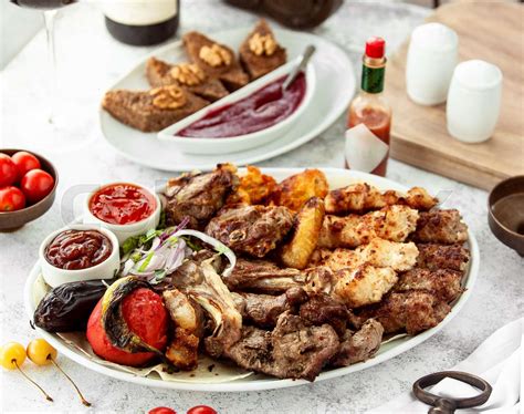 Azerbaijani kebab platter with lamb chicken vegetable kebabs | Stock image | Colourbox