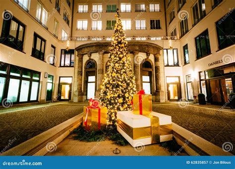 Christmas Tree and Buildings at Night, in Munich, Germany. Editorial ...