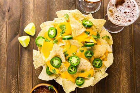 Nachos stock photo. Image of jalapeno, tomatoes, snack - 58570230