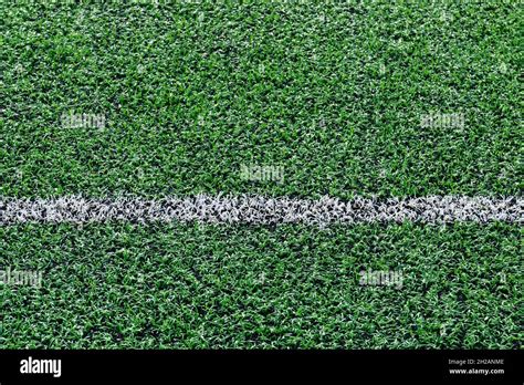 Artificial turf football field Stock Photo - Alamy