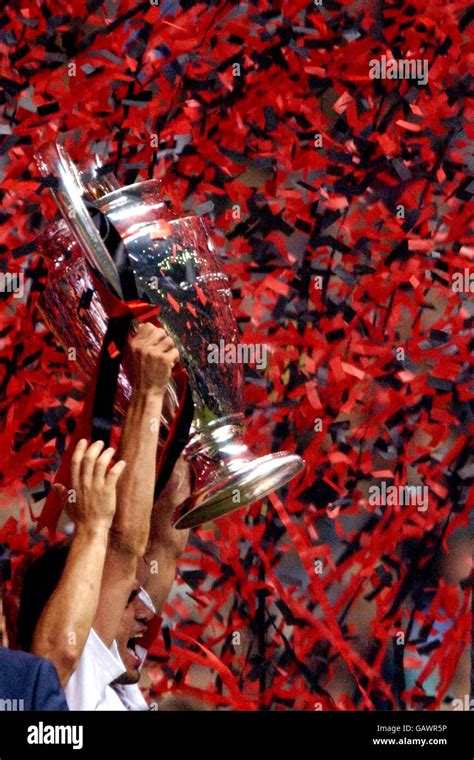 Ac milan players lift the champions league trophy hi-res stock ...