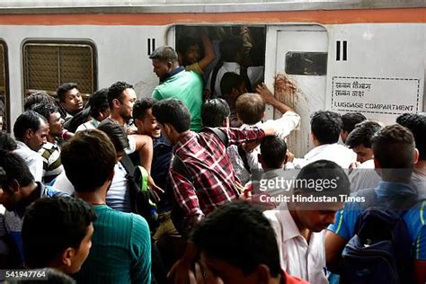 Mumbai Train Services Affected Due To Monsoon Rains Photos And Premium