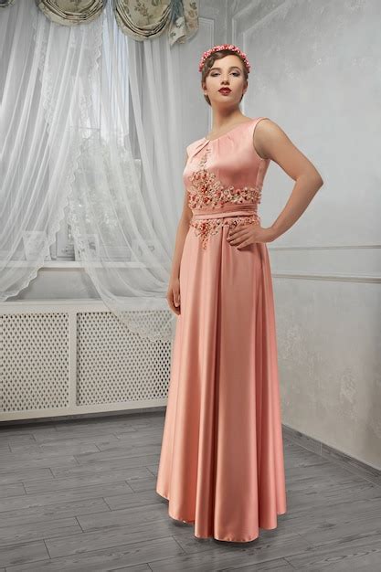 Premium Photo Pretty Woman In Peach Long Dress