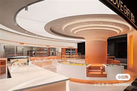 The Interior Of A Food Court With An Orange And White Color Scheme On