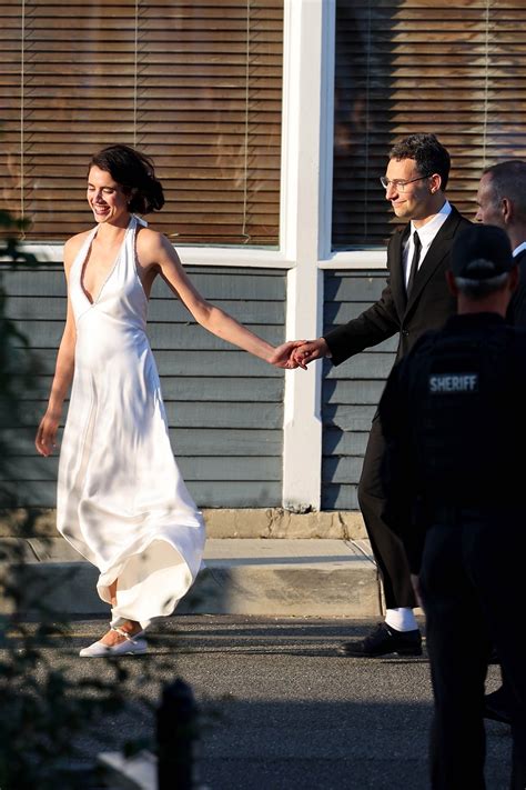 Margaret Qualley wears a second puff-sleeved dress for her wedding reception with Jack Antonoff ...