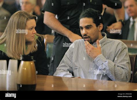 Esteban Carpio, right, talks with his attorney Kirsten M. Wenge during ...