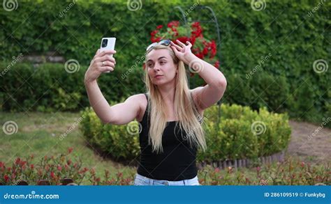 Blonde Woman Taking Selfies In The Park Video Stock Video Video Of Lovely Taking 286109519