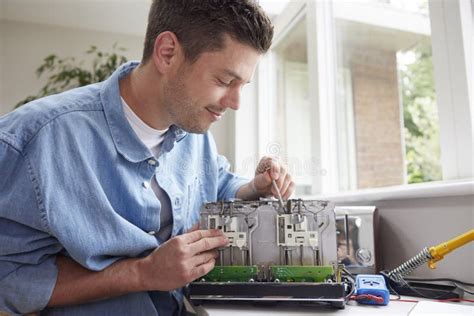 Man Fixing Electric Toaster Rather Than Buying New Product Sustainable