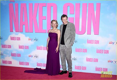 Pamela Anderson Gives Liam Neeson Kiss On The Cheek At The Naked Gun Premiere In London Photo