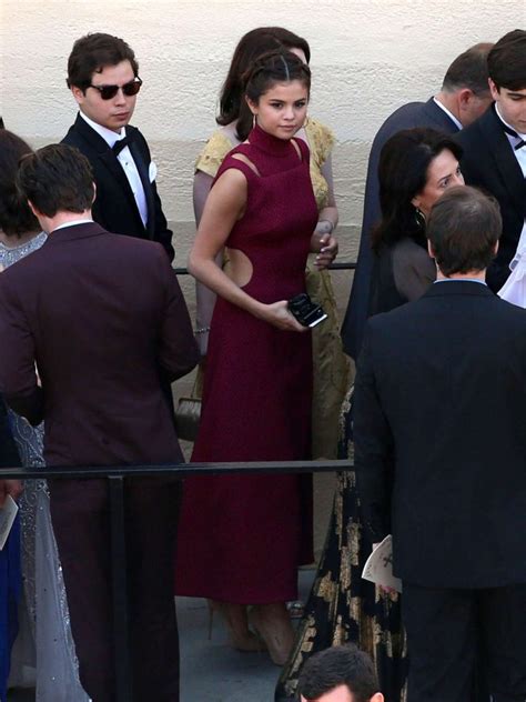 Selena Gomez at David Henrie and Maria Cahills Wedding -20 - GotCeleb