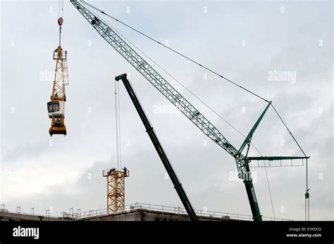 Construction Workers Dismantling Tower Crane Stock Photo Alamy