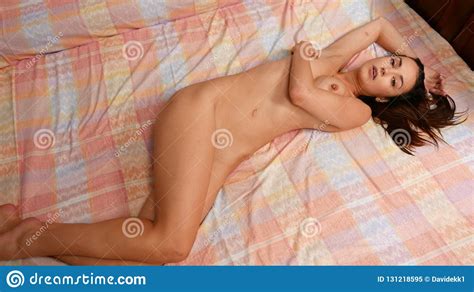 Close Up Nude Model Lying In Bed Stock Image Image Of Beauty Bedroom 131218595