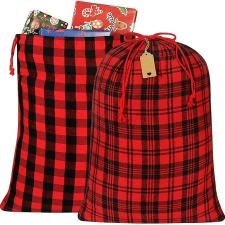 Two Red And Black Plaid Bags With Tags On Them