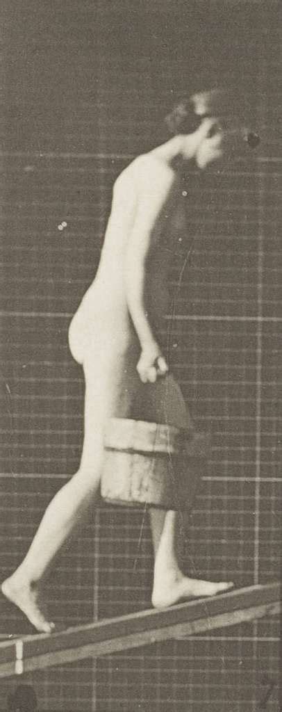 Nude Woman Ascending An Incline With A Bucket Of Water In Right Hand