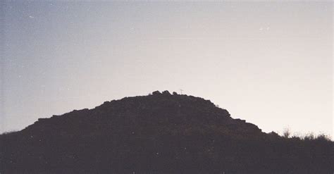 Silhouette of a Hill at Dusk · Free Stock Photo