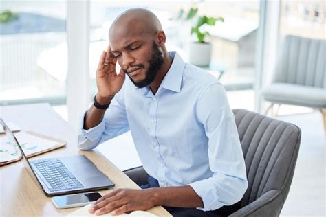 Premium Photo Burnout Headache And Stressed Businessman Working On