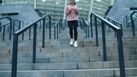 Premium Photo Fitness Woman Running Down Stairs Sporty Girl Resting